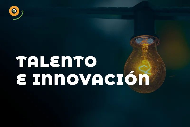 Talento e innovación: un foco encendido sobre fondo oscuro con el símbolo de Praktiko